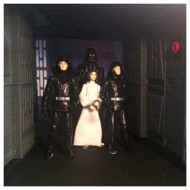 Darth Vader enters with Princess Leia, flanked by two guards. Her hands are bound. #starwars #anhwt #toyshelf